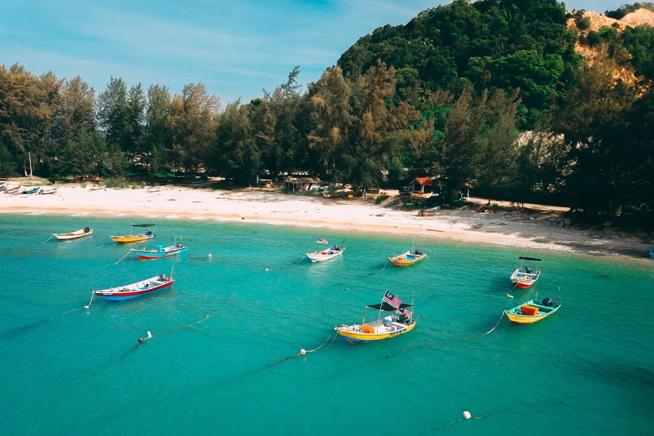 Boats moored in water