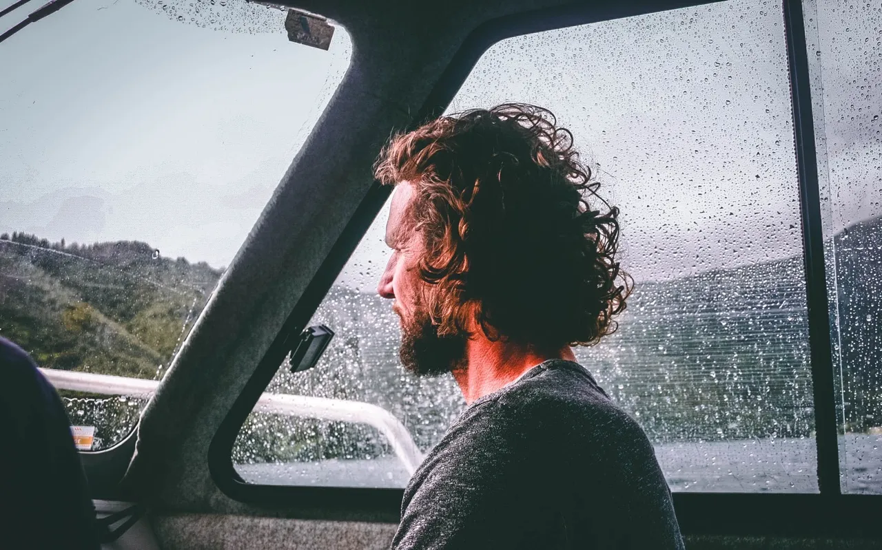 Man wearing gray neck shirt